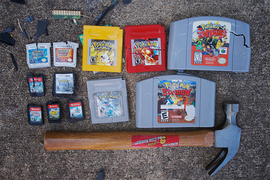 A hammer and some smahed Pokemon game cartridges, signalling misuse? I don't know. It was on Unsplash.