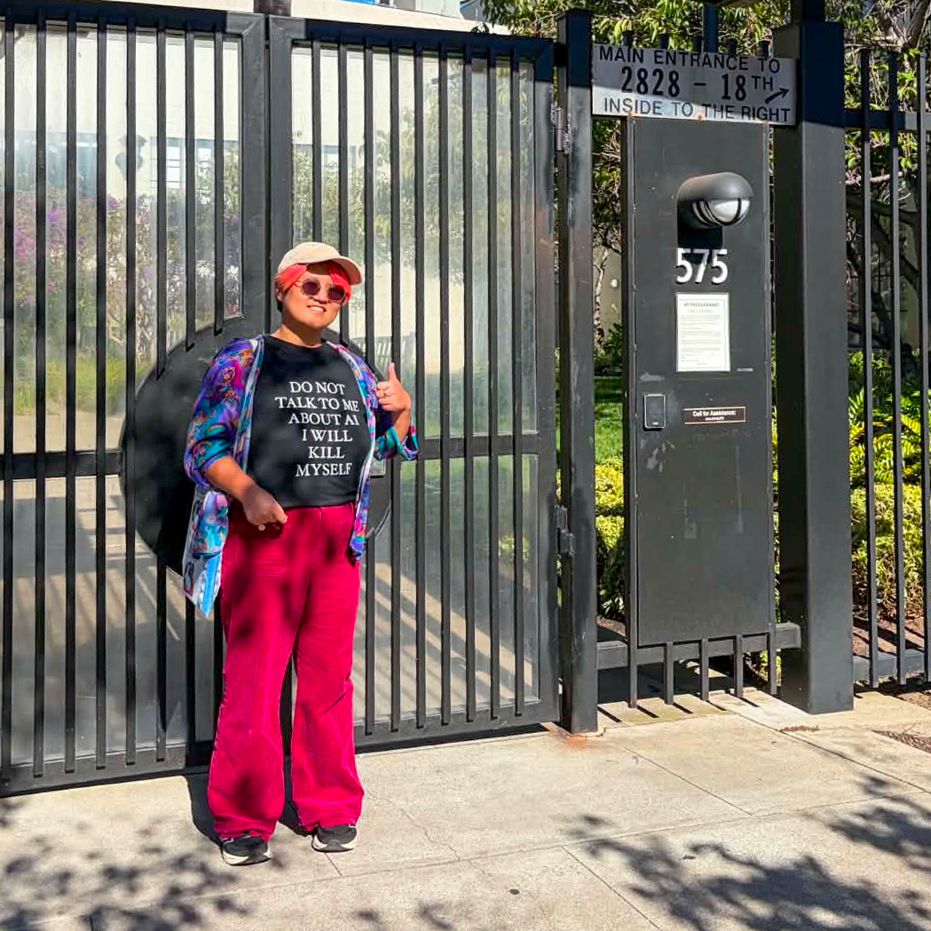 Myself wearing a shirt that says, Don't talk to me about AI I will kill myself